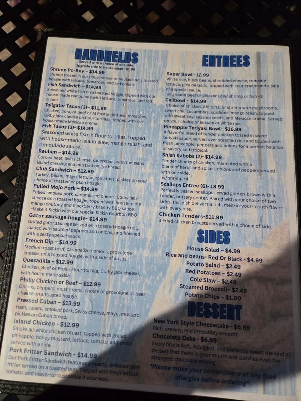Food menu beside drinks and appetizers.